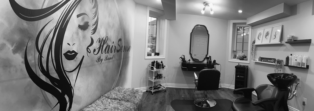 Inside the HairSense salon, with styling chairs and mirrors
